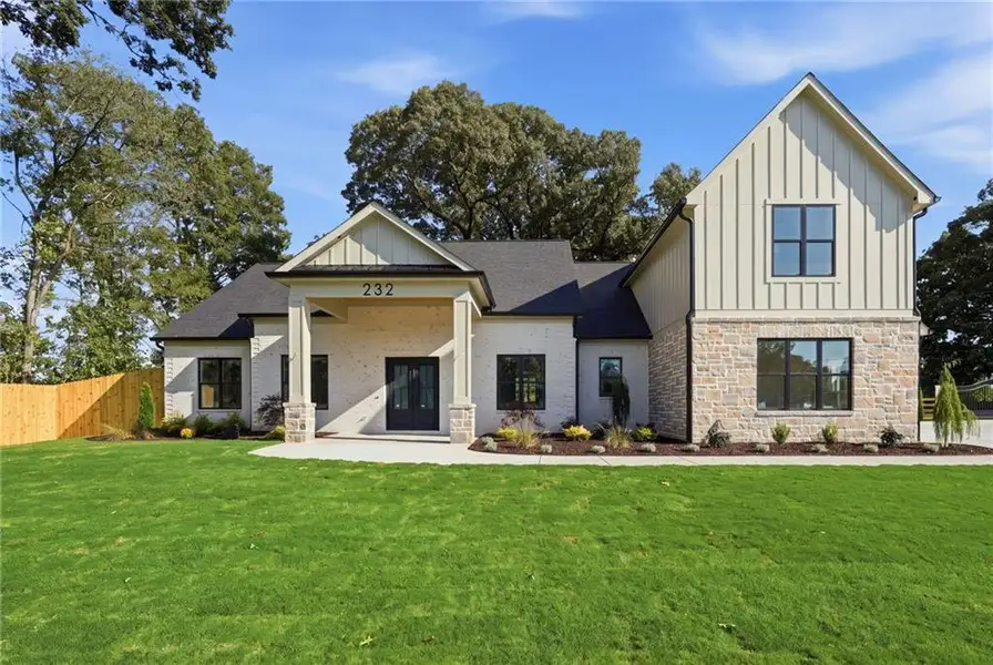 Front exterior of a new home in , Winder, GA, highlighting curb appeal (Image 5).