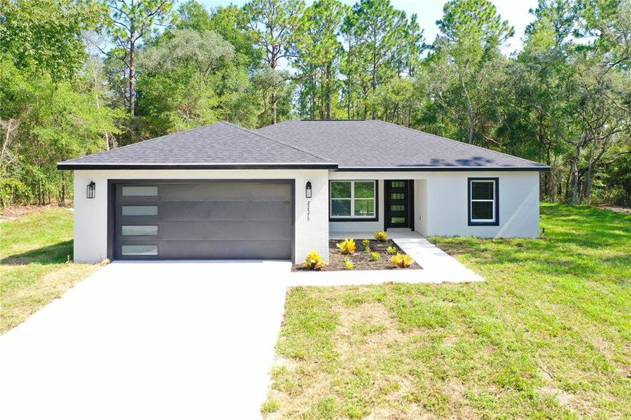 Front exterior of a new home in , Dunnellon, FL, highlighting curb appeal (Image 29).