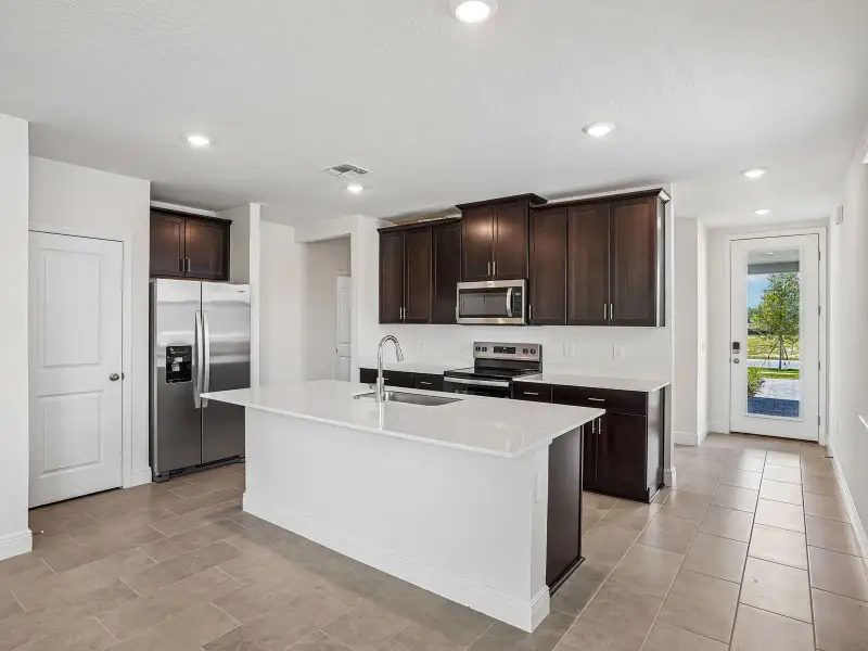 Furnished interior view inside a new home in Villamar - Classic Series, Winter Haven (Image 3).
