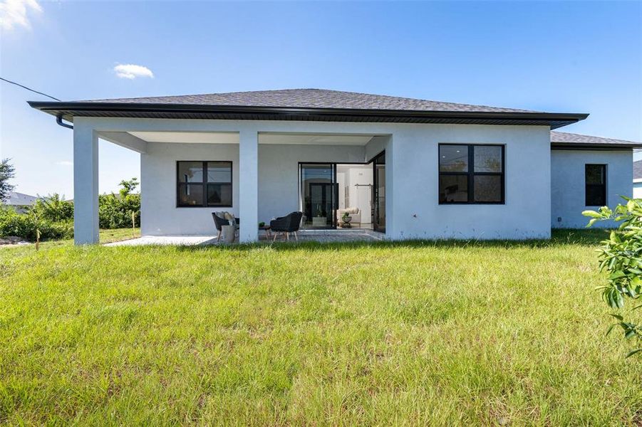 Exterior details and patio area of a home in , Englewood (Image 2). Exterior details and patio area of a home in , Englewood (Image 2).