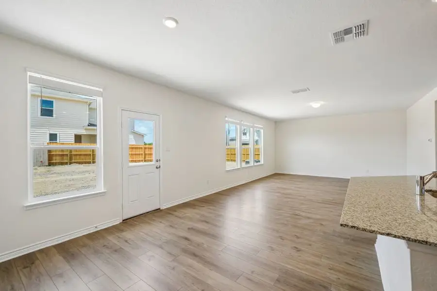 Spacious, unfurnished interior of a new home in Preserve at Culebra - Sterling Collection, San Antonio (Image 19).