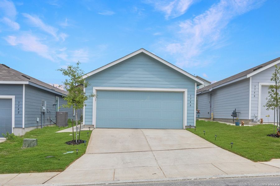 Front exterior of a new home in Brookmill, San Antonio, TX, highlighting curb appeal (Image 21).