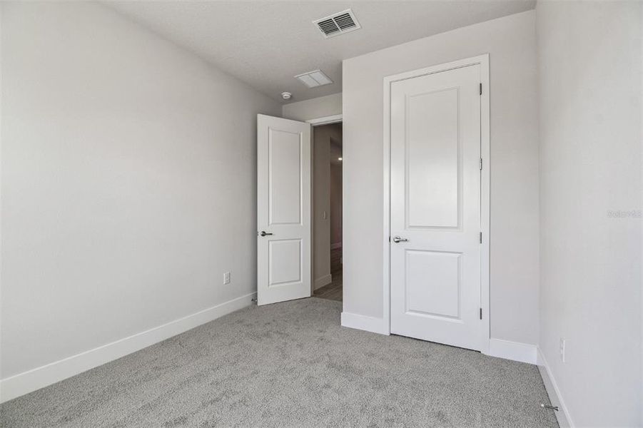 Spacious, unfurnished interior of a new home in Waterset Tradition Series, Apollo Beach (Image 32).