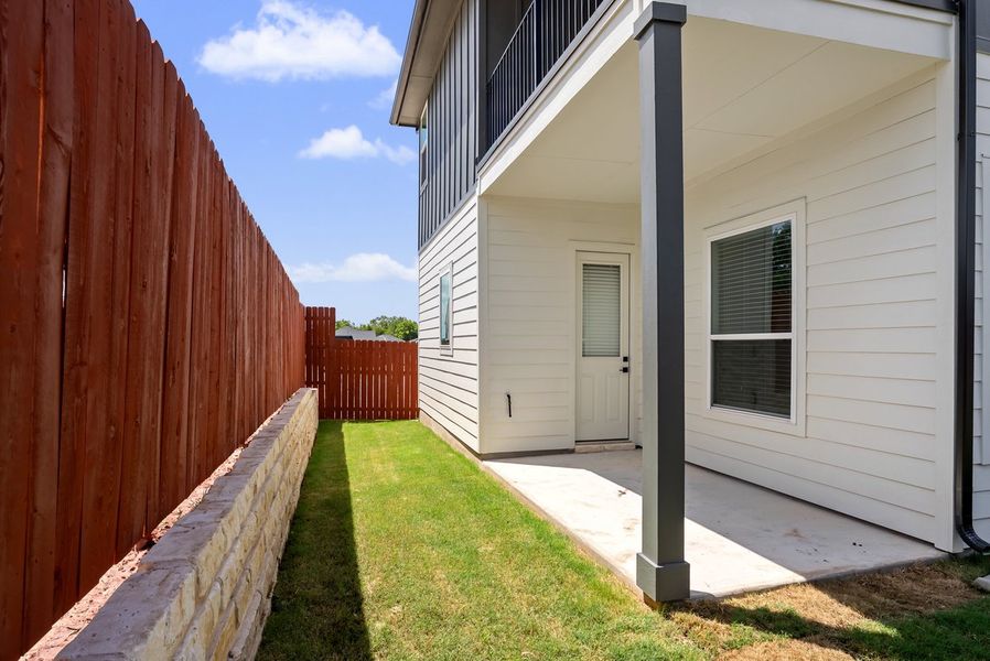 Front exterior of a new home in Foxfield, Austin, TX, highlighting curb appeal (Image 18). Front exterior of a new home in Foxfield, Austin, TX, highlighting curb appeal (Image 18).