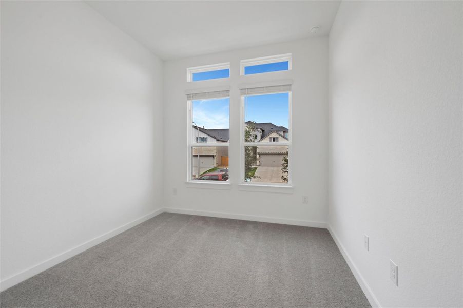 Spacious, unfurnished interior of a new home in Cedar Brook, Leander (Image 15).