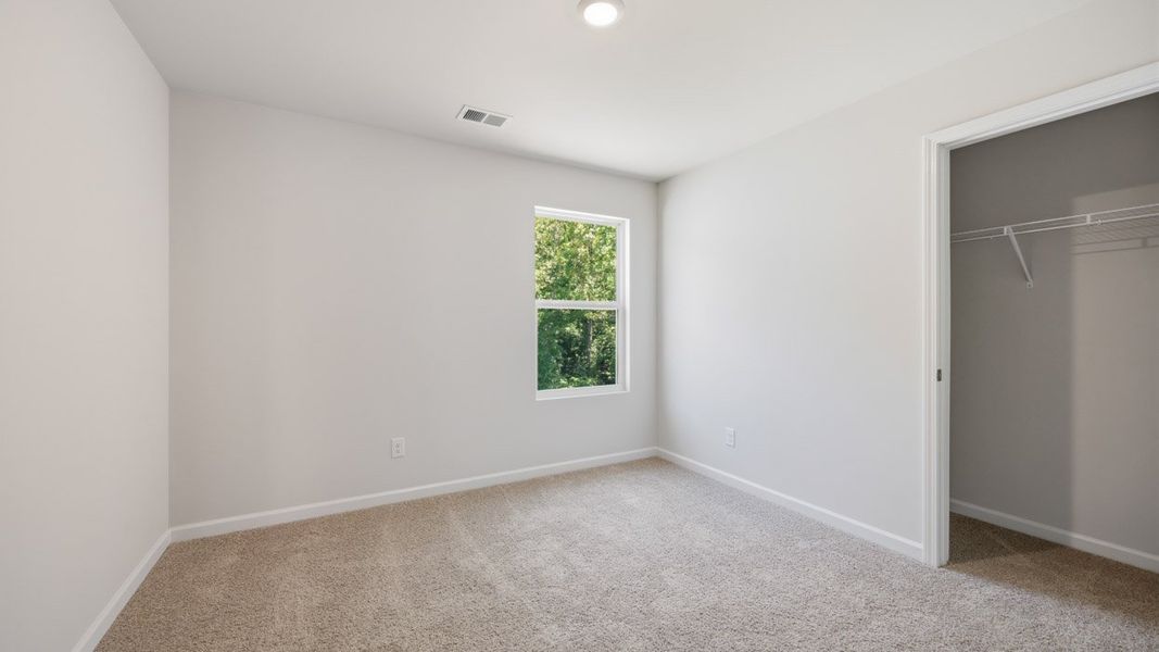 Representative unfurnished interior of a home built from the Hillcrest by D.R. Horton in Shoal Creek, Hampton (Image 24).