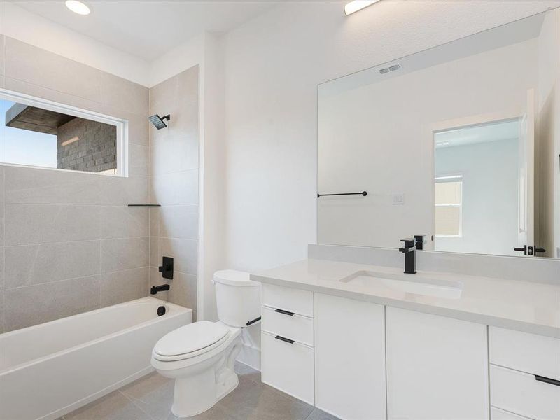 Furnished interior view inside a new home in Royal Court, Little Elm (Image 7).