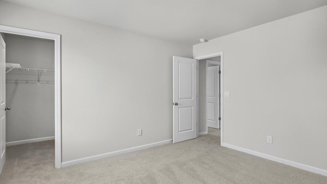 Spacious, unfurnished interior of a new home in The Preserve at Tidewater, Sneads Ferry (Image 41).