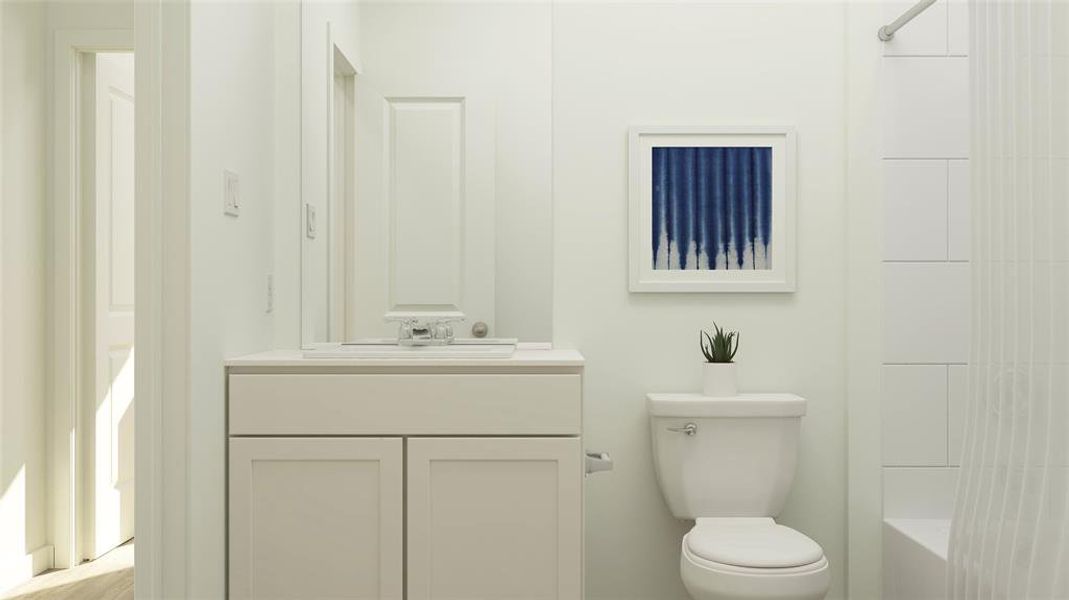 Bathroom with vanity and toilet