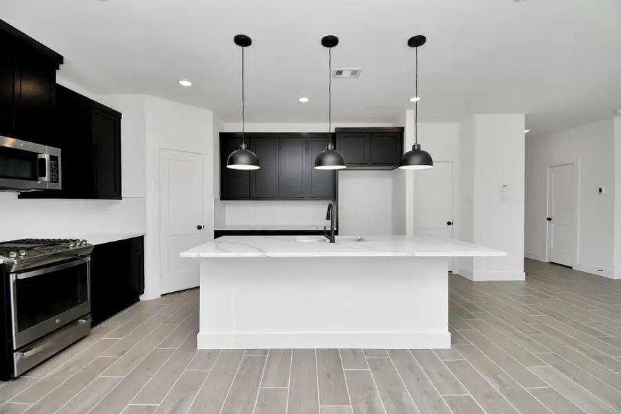 Furnished interior view inside a new home in Meridiana, Rosharon (Image 7).