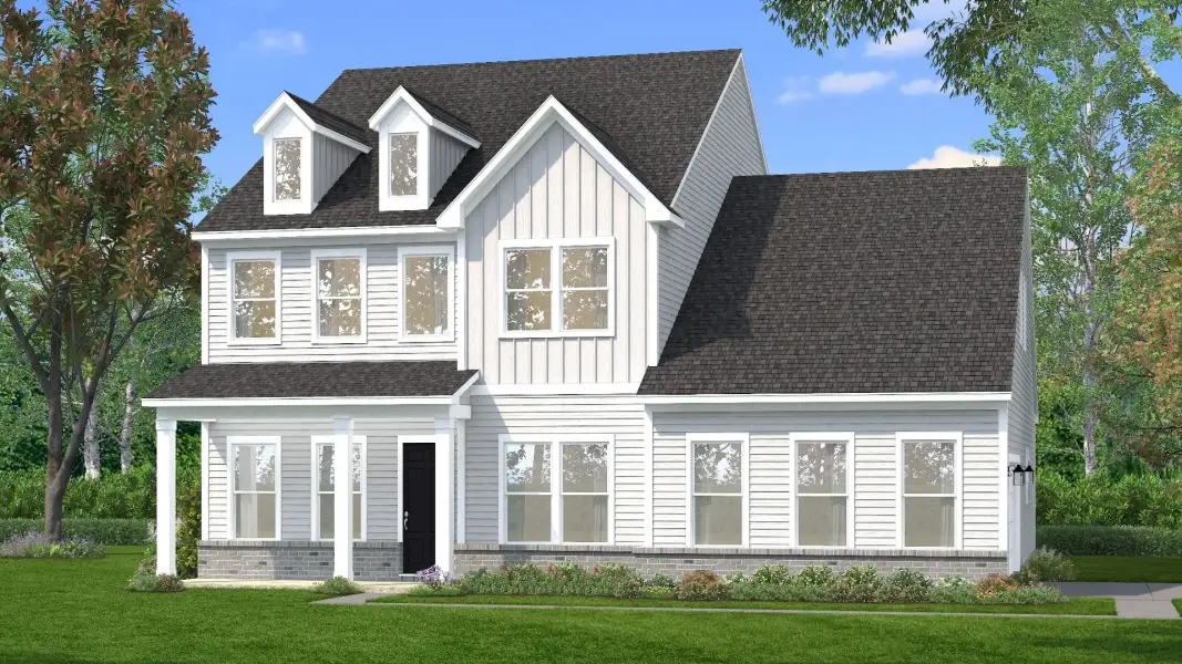 Exterior of home with white siding and brick water table featuring a side-entry garage Exterior of home with white siding and brick water table featuring a side-entry garage