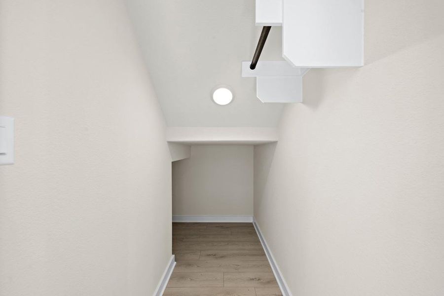 Spacious, unfurnished interior of a new home in Terrace Collection At Turner's Crossing, Buda (Image 19).