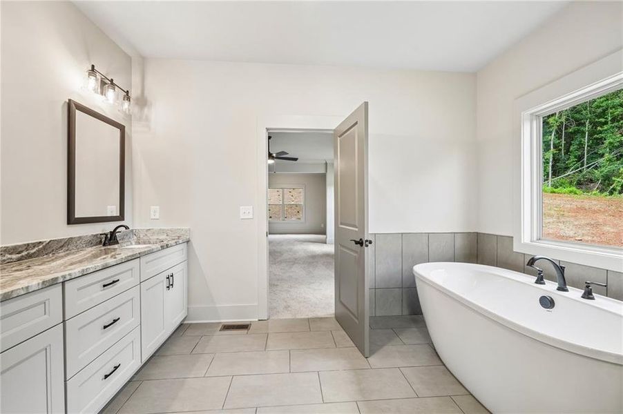 Furnished interior view inside a new home in Steeplechase, Hoschton (Image 18).