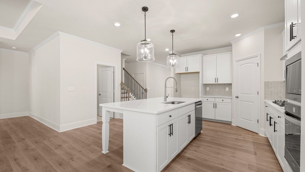 Representative furnished interior of a home built from the WINDSOR by D.R. Horton in Butner Estates, South Fulton (Image 11).