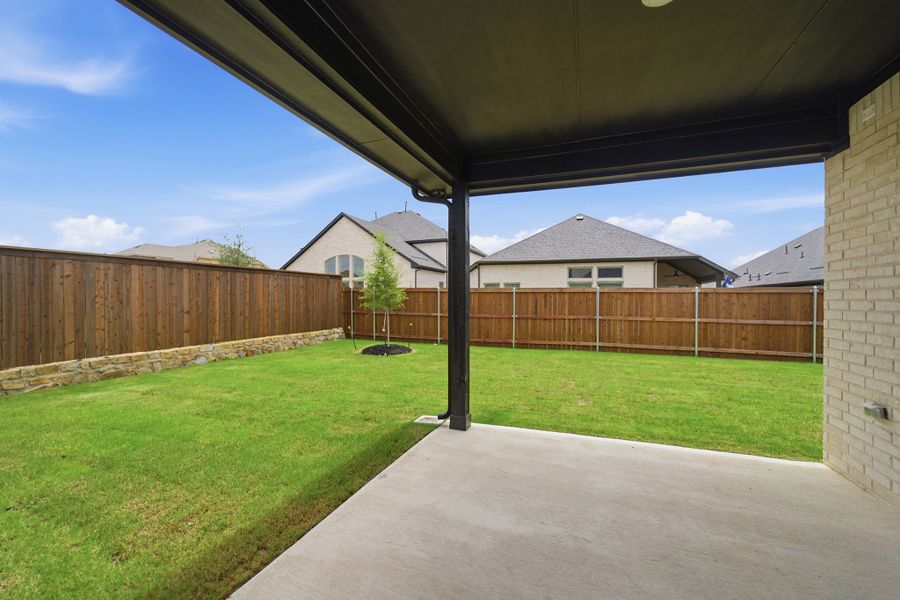 Exterior details and patio area of a home in La Terra, Celina (Image 27). Exterior details and patio area of a home in La Terra, Celina (Image 27).