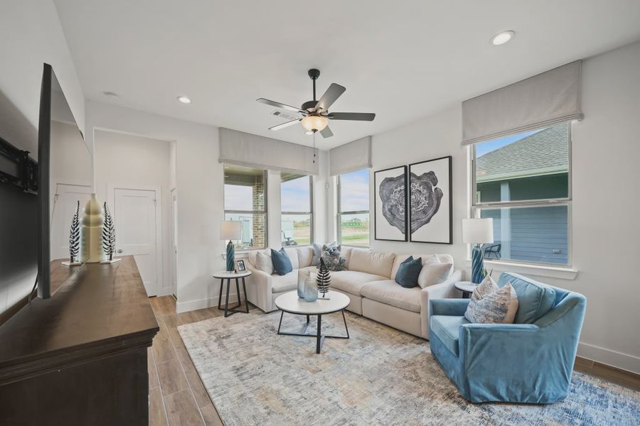 Representative furnished interior of a home built from the Athens by Chesmar Homes in Sunterra, Katy (Image 10).