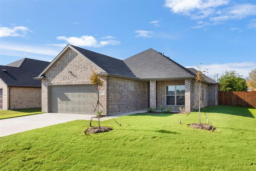 Front exterior of a new home in , Italy, TX, highlighting curb appeal (Image 2).