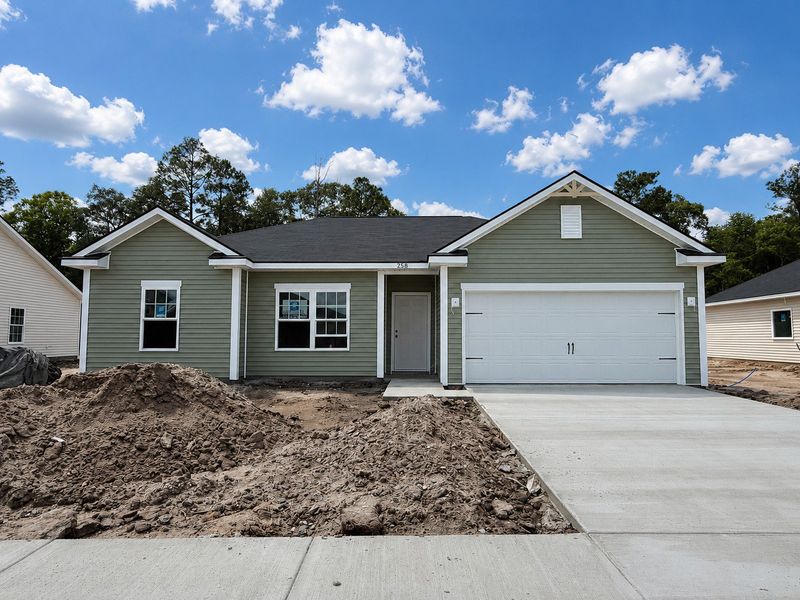 Front exterior of a new home in Grand Reserve, Hinesville, GA, highlighting curb appeal (Image 1). Front exterior of a new home in Grand Reserve, Hinesville, GA, highlighting curb appeal (Image 1).