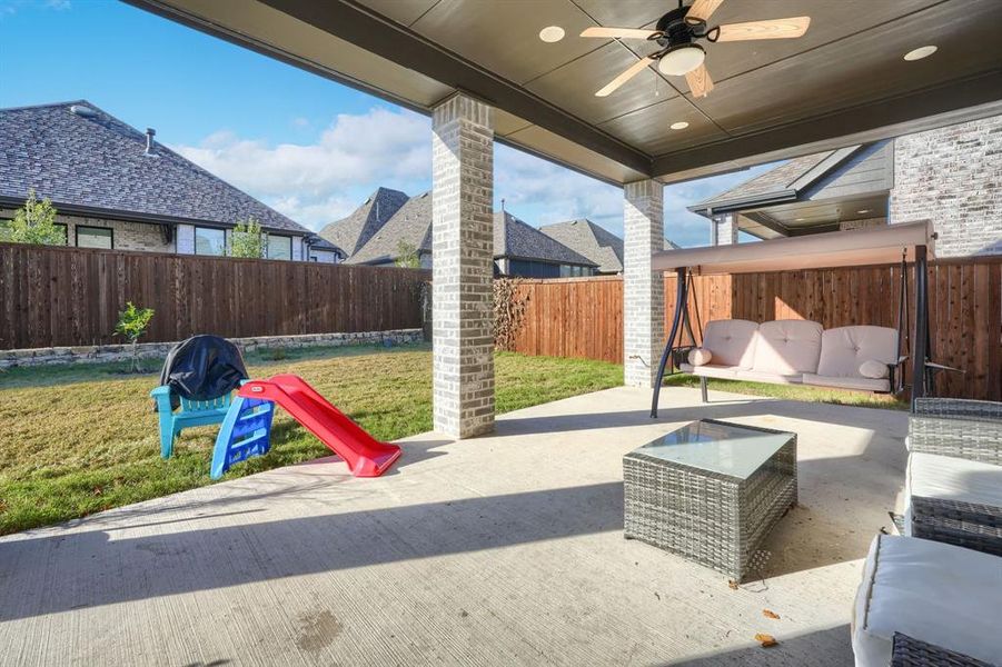 View of patio / terrace with an outdoor living space and ceiling fan