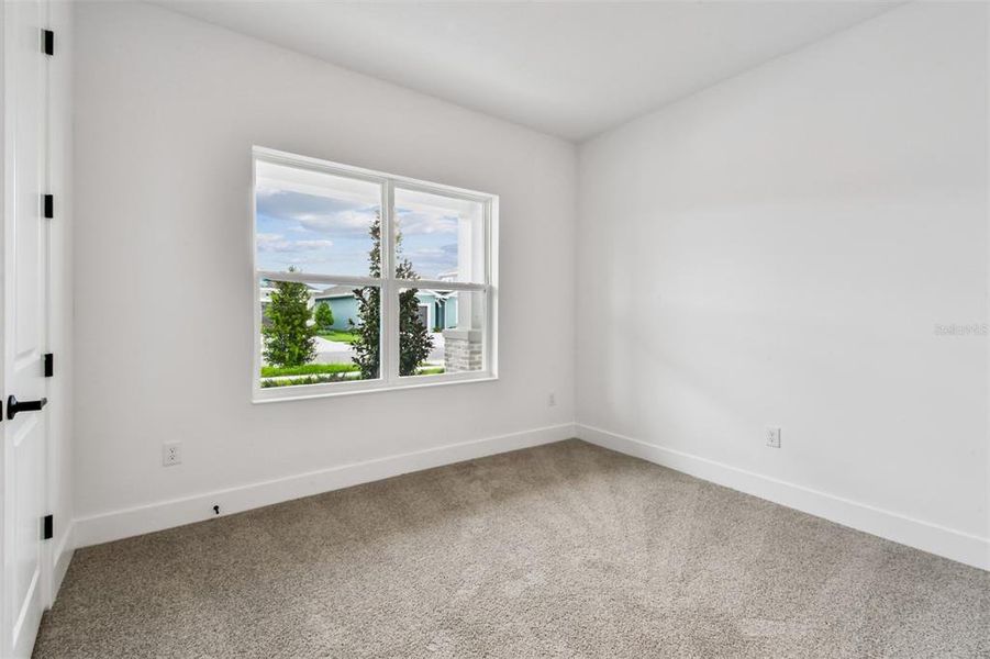 Spacious, unfurnished interior of a new home in The Peninsula at Rhodine Lake, Riverview (Image 35).