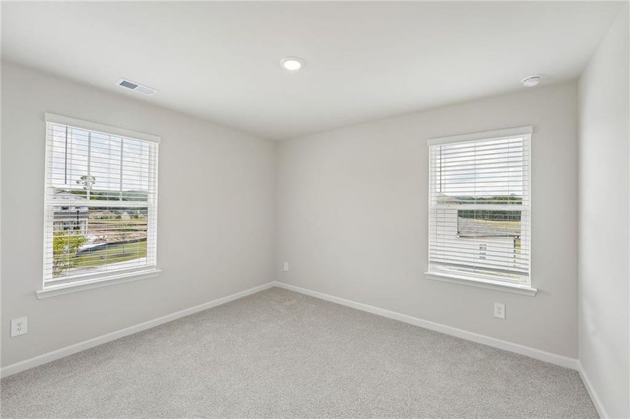 Spacious, unfurnished interior of a new home in Northwoods at Mirror Lake, Villa Rica (Image 43).