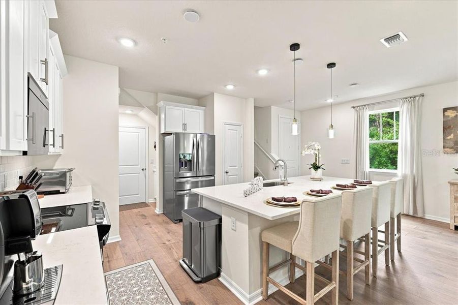 Furnished interior view inside a new home in Towns at Riverwalk, Sanford (Image 6). Furnished interior view inside a new home in Towns at Riverwalk, Sanford (Image 6).