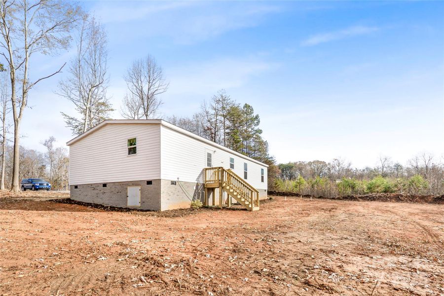 Exterior details and patio area of a home in , Ellenboro (Image 17).