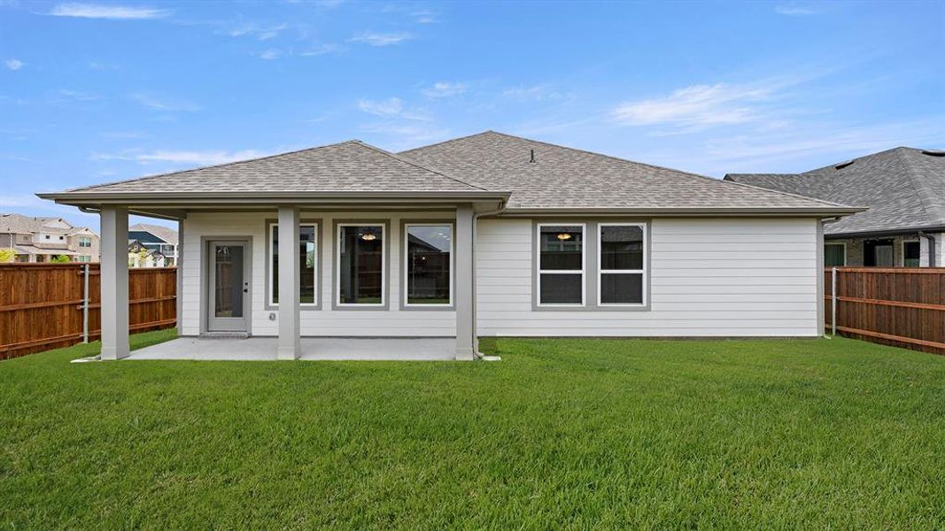 Exterior details and patio area of a home in Waterscape, Royse City (Image 4). Exterior details and patio area of a home in Waterscape, Royse City (Image 4).