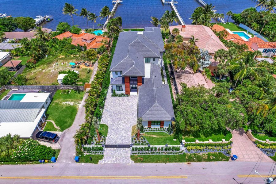 Front exterior of a new home in , Lantana, FL, highlighting curb appeal (Image 26).