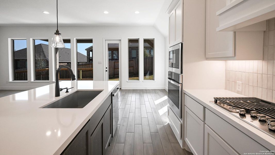 Furnished interior view inside a new home in Homestead 65', Schertz (Image 10).