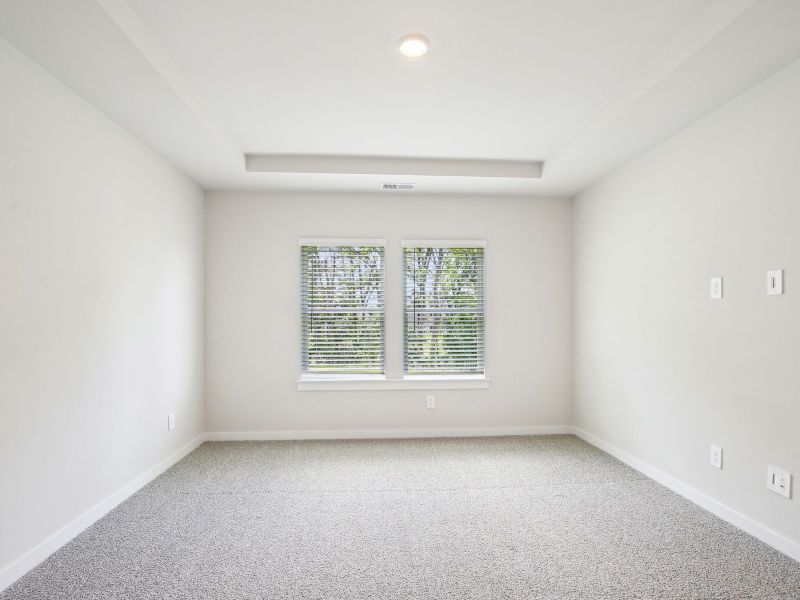 Primary suite in the Sherwood floorplan in a Meritage Homes community. Primary suite in the Sherwood floorplan in a Meritage Homes community.