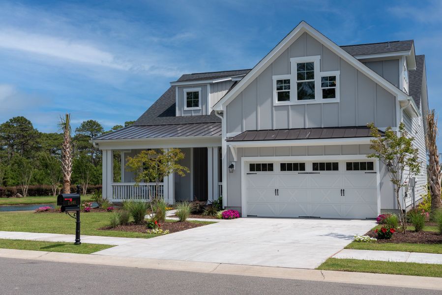 Representative exterior photo of a completed home built from the Ashton by Bill Clark Homes in Osprey Landing, Southport, NC (Image 26). Representative exterior photo of a completed home built from the Ashton by Bill Clark Homes in Osprey Landing, Southport, NC (Image 26).