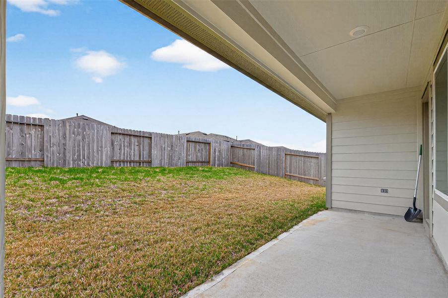 Exterior details and patio area of a home in Presswoods, Splendora (Image 26).
