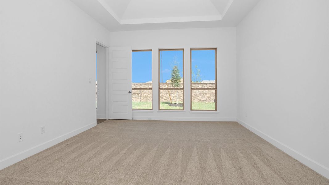 Spacious, unfurnished interior of a new home in Lakes of Cane Island, Katy (Image 22).
