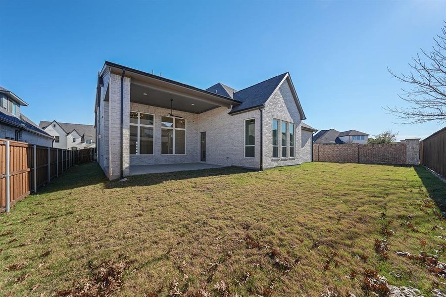 Exterior details and patio area of a home in Estates at Rockhill, Frisco (Image 3). Exterior details and patio area of a home in Estates at Rockhill, Frisco (Image 3).
