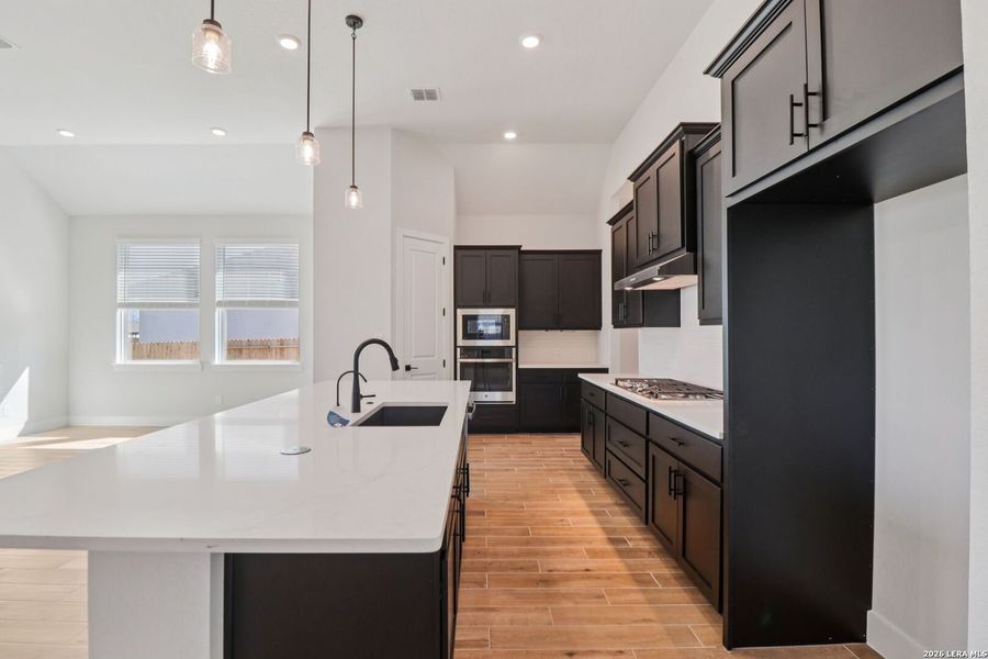 Furnished interior view inside a new home in Village at Three Oaks, Seguin (Image 7).