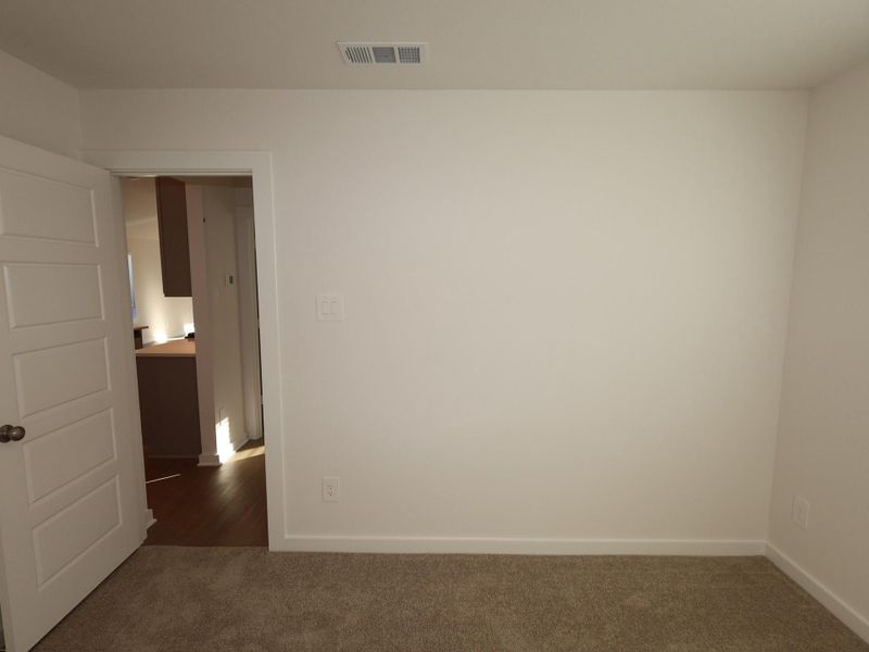 Spacious, unfurnished interior of a new home in Pinewood at Grand Texas, New Caney (Image 11).