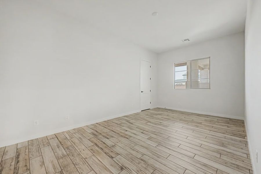 Spacious, unfurnished interior of a new home in Valencia at Granite Vista, Waddell (Image 29).