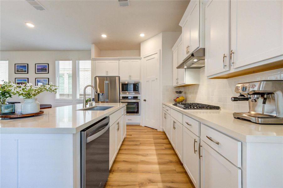Sellers upgraded the dishwasher and cooktop after purchasing from builder.