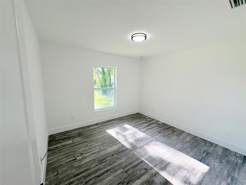 Spacious, unfurnished interior of a new home in , Okeechobee (Image 30).