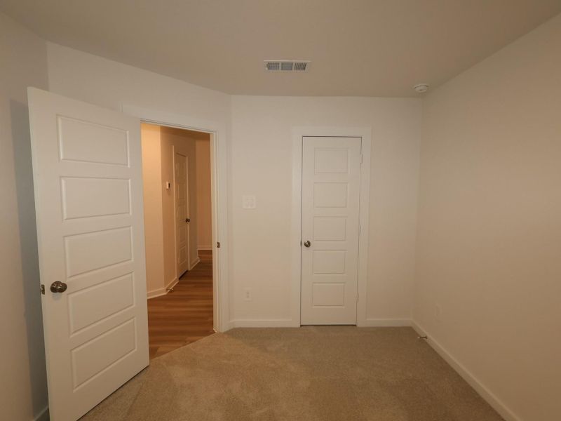 Spacious, unfurnished interior of a new home in Pinewood at Grand Texas, New Caney (Image 21).