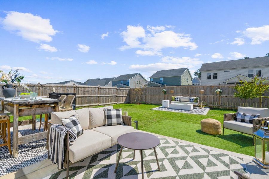Exterior details and patio area of a home in Sweetgrass at Summers Corner, Summerville (Image 4).