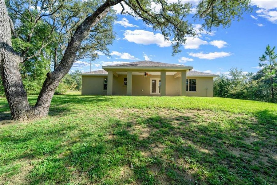 Front exterior of a new home in , Dunnellon, FL, highlighting curb appeal (Image 20).