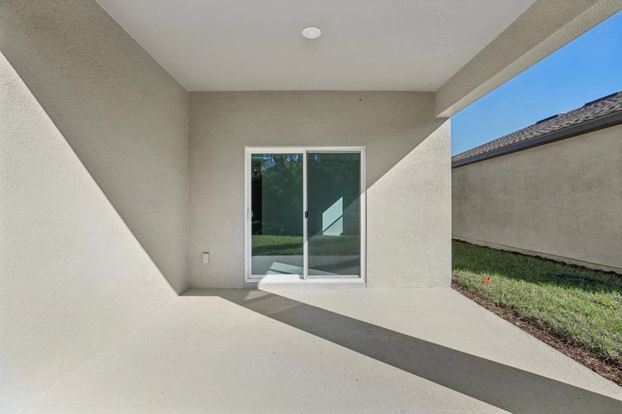 Representative exterior details of a home built from the Equinox by Starlight Homes in Hawks Run, Kissimmee (Image 3).