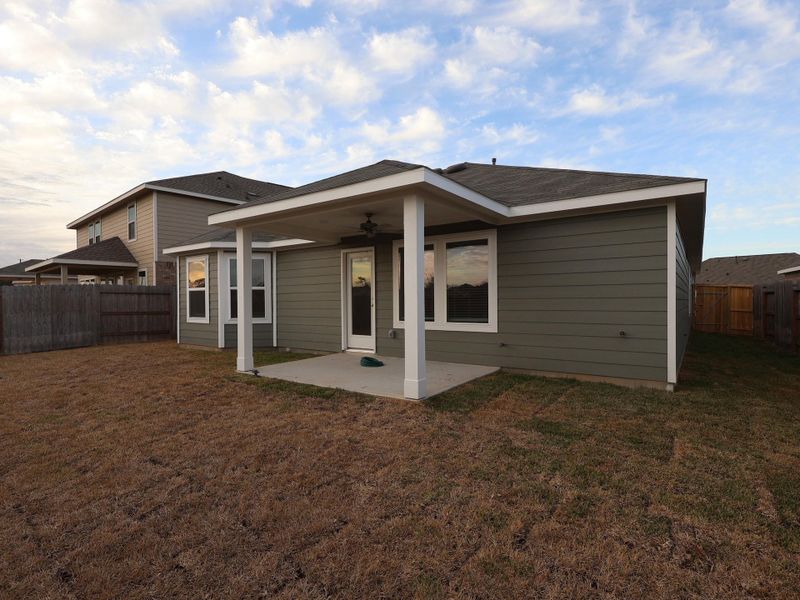 Exterior details and patio area of a home in Pinewood at Grand Texas, New Caney (Image 3).