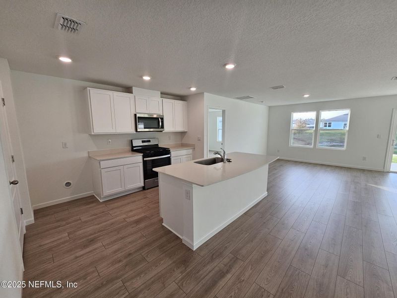 Furnished interior view inside a new home in Entrada, St. Augustine (Image 11).