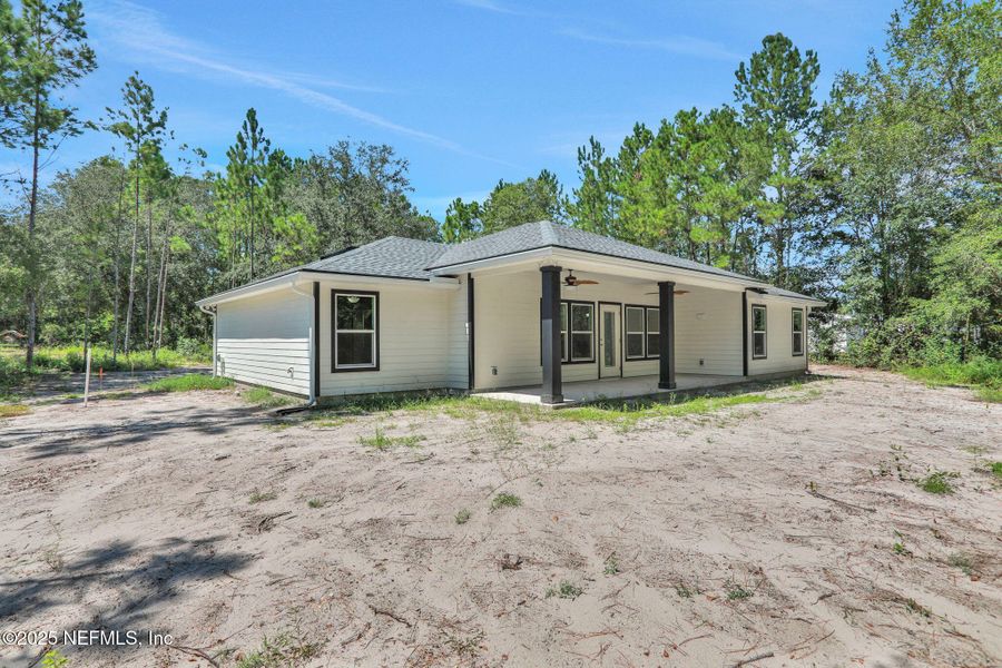 Front exterior of a new home in , Middleburg, FL, highlighting curb appeal (Image 25).