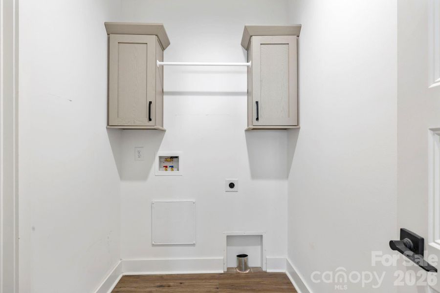 Dedicated Laundry Room w/ access from the Primary Suite & Hall
