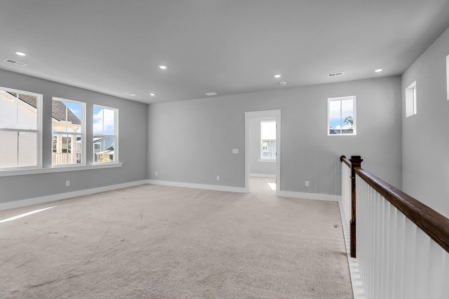 Spacious, unfurnished interior of a new home in Carnes Crossroads: Row Collection, Summerville (Image 26). Spacious, unfurnished interior of a new home in Carnes Crossroads: Row Collection, Summerville (Image 26).