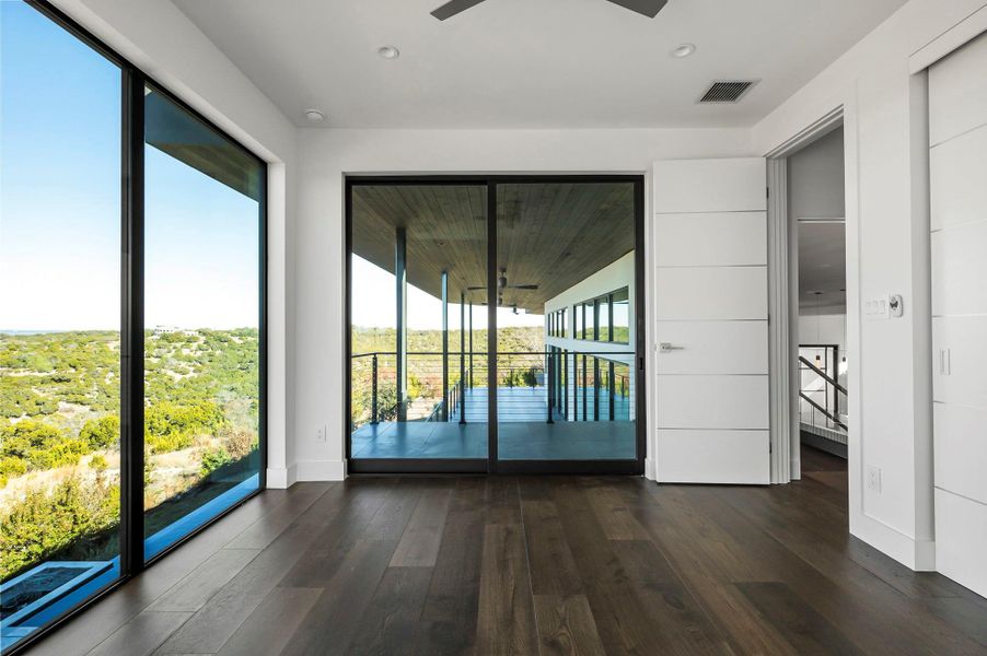 Exterior details and patio area of a home in , Spicewood (Image 28).